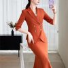 Women's Spring and Summer Solid Lapel Double-Breasted Half-Sleeved Suit Skirt Set